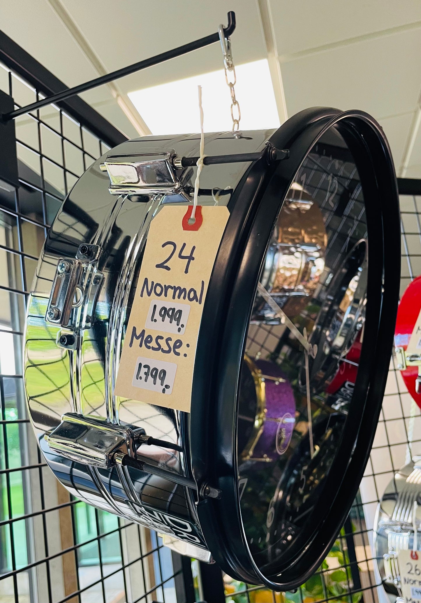 (24) 14" x 7" Chain Clock